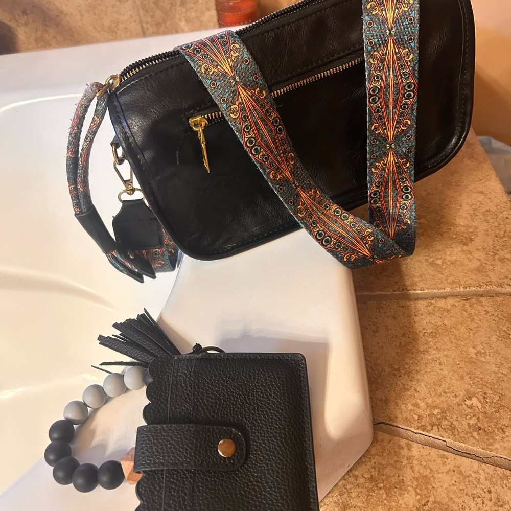 Black Leather Crossbody Bag with Patterned Strap